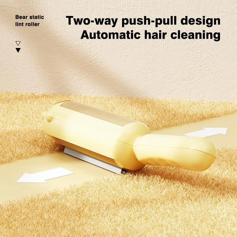 Blue reusable pet hair remover tool with a rolling head and self-cleaning base.