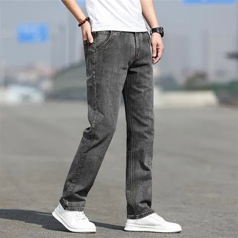 Men's straight leg jeans in smoky grey high elasticity fabric with zip fly closure