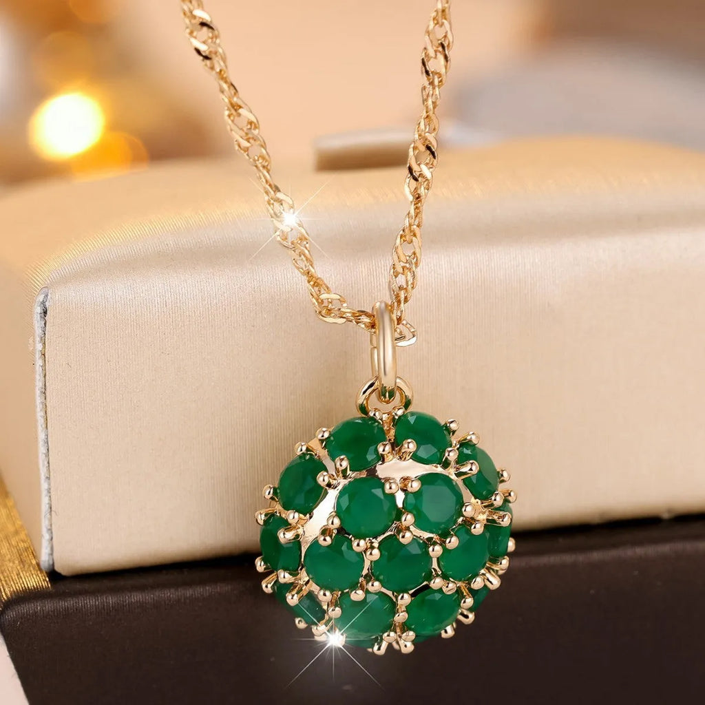 Champagne gold emerald diamond necklace with geometric pendant on adjustable chain
