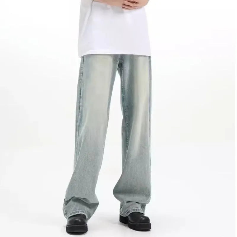 Blue retro-style loose casual trousers with an elastic waistband on a hanger.
