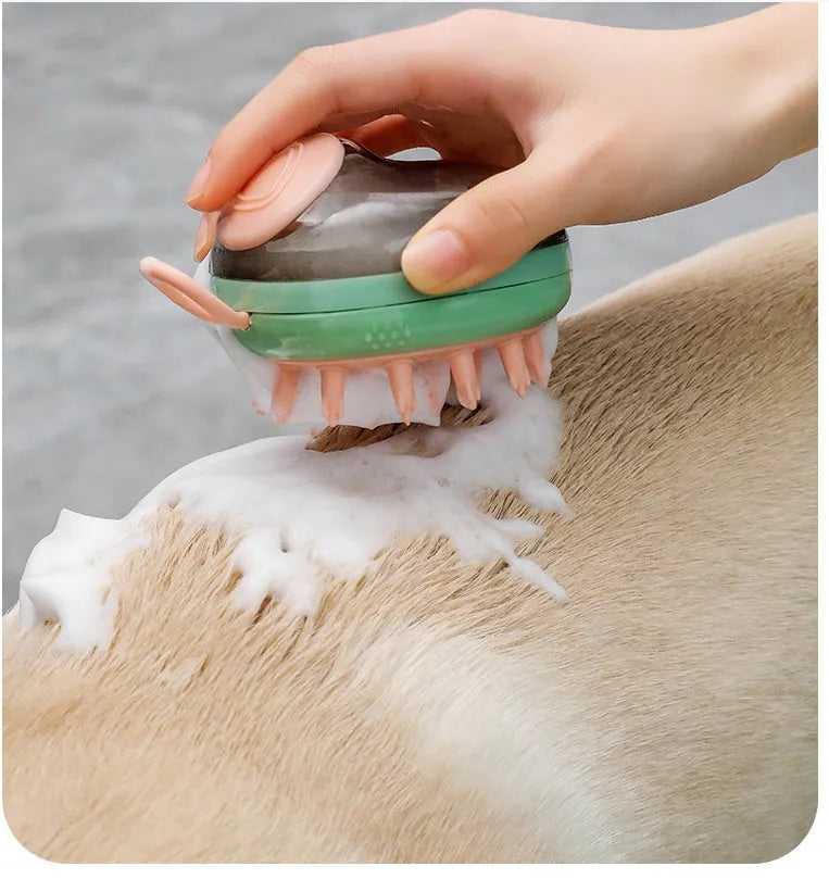 Blue pet bath brush and shampoo dispenser with soft silicone bristles and a hang hole