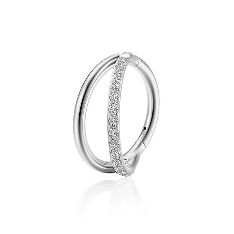 Close-up of a titanium alloy fork nose ring on a plain background, showing the straight post and bent back design.