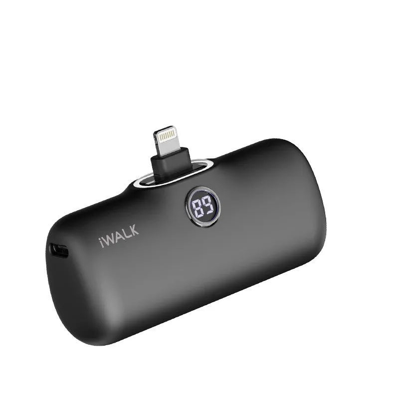 Small white cylindrical lipstick-shaped power bank showing digital battery percentage display on its side.