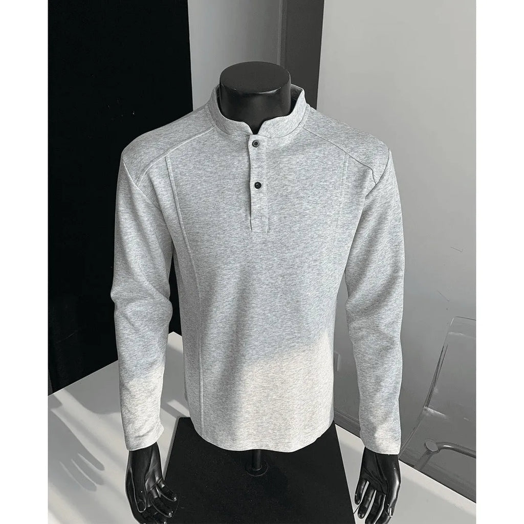 Men's loose-fit long-sleeve polo shirt with a stand-up collar and asymmetric patchwork design in Chinese cotton.