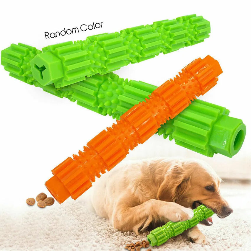 Green and orange rubber dog chew toy with treat dispensing compartment and squeaker for aggressive chewers