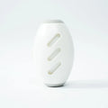 Green washable reusable gel lint roller ball for pet hair removal on fabric.