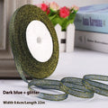 Roll of narrow 0.6cm wide polyester gift ribbon in a choice of colours including metallic gold and silver.