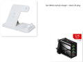A white 4-in-1 wireless charging station with an iPhone, Apple Watch, and AirPods charging on its adjustable, foldable stand.