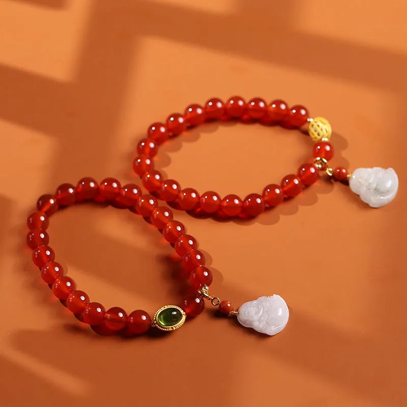 Red agate and amber women's bracelet with geometric Chinese design and hanging Maitreya Buddha charm