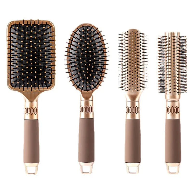 Brown ABS airbag comb with oval head and cushioned base for scalp massage