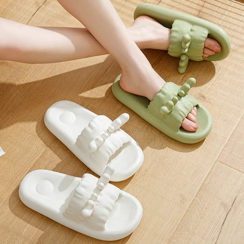 White EVA flip flop slippers with a cute deer horn design and a non-slip sole.