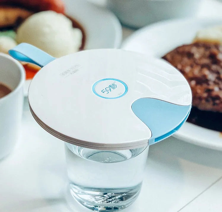 Compact blue or pink portable UV baby bottle sterilizer showing USB port and dimensions.
