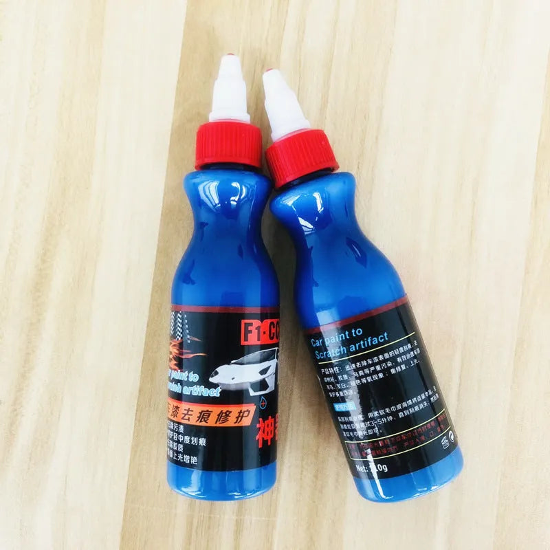 Small blue car wiping tool and scratch repair agent for automotive paint touch-ups