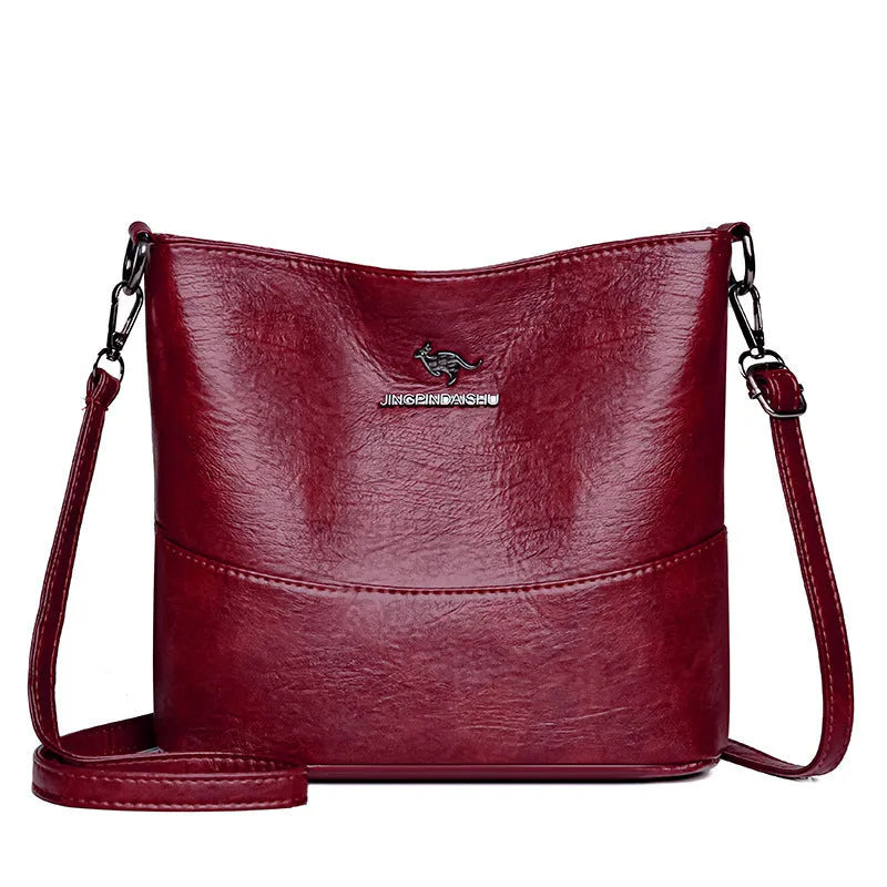 Women's soft leather shoulder bag in bucket shape with large capacity
