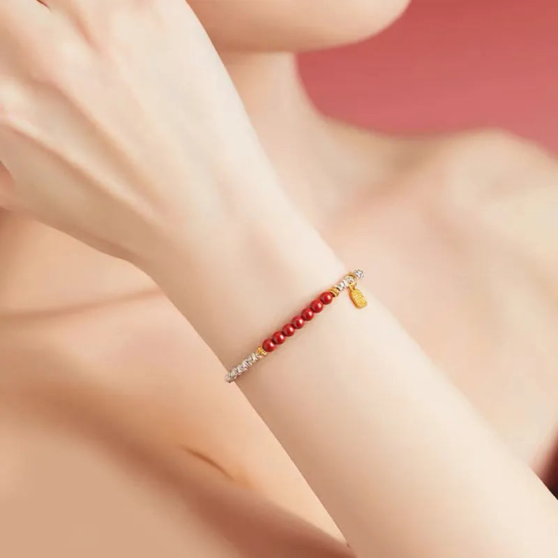 Silver geometric couple bracelet with round beads showing white K electroplated finish on 16cm length