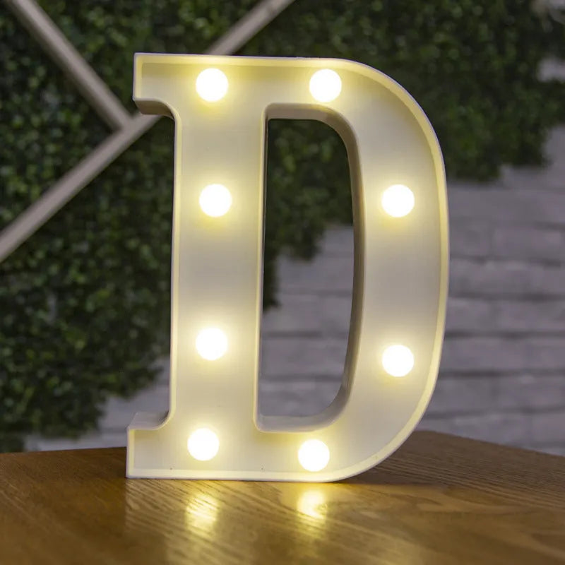 White plastic LED marquee letter sign with warm white glow, 22cm tall