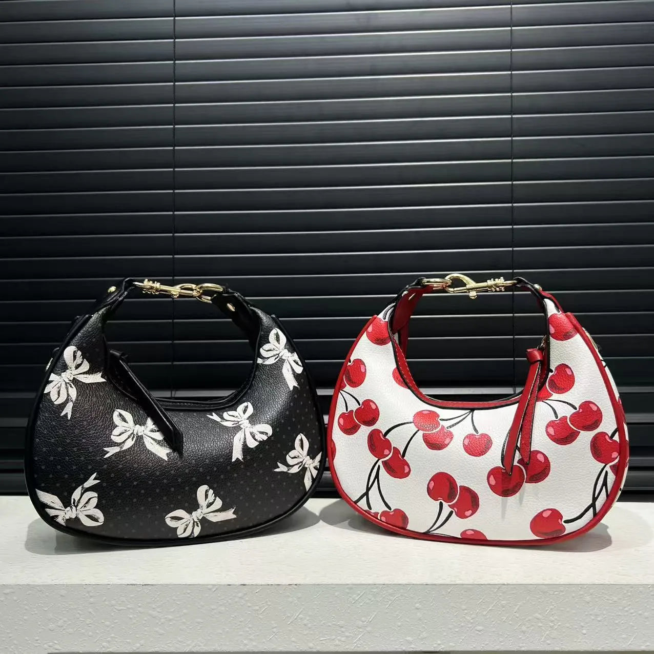 Stitching soft PU leather hobo crossbody bag for women in black with love and chain details, urban simplicity style