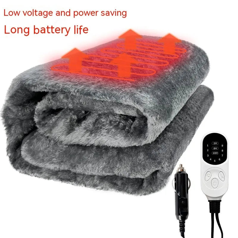Grey 12v car electric blanket with power cord and controller on a car seat.
