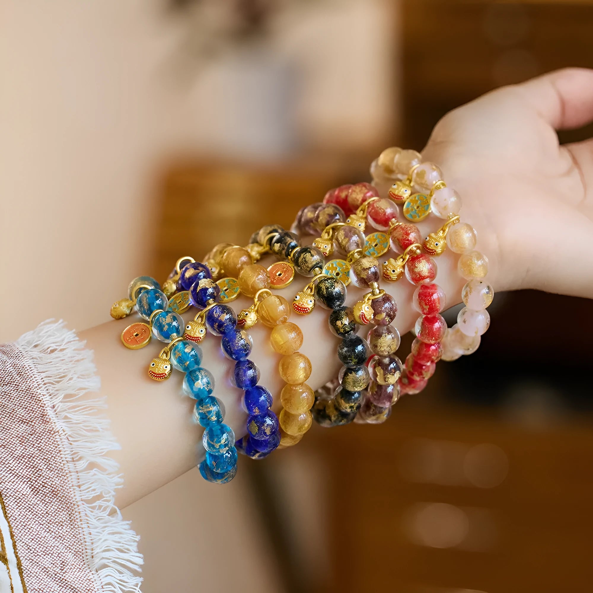 Handmade national style bracelet with gold foil coloured glaze swallowing gold beast charm