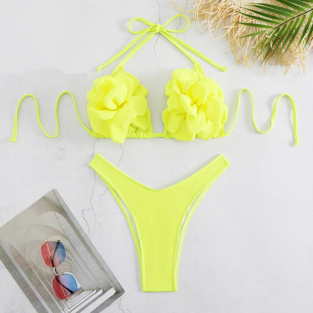 Three-dimensional 3D flower pattern on low waist bikini swimsuit in solid colour