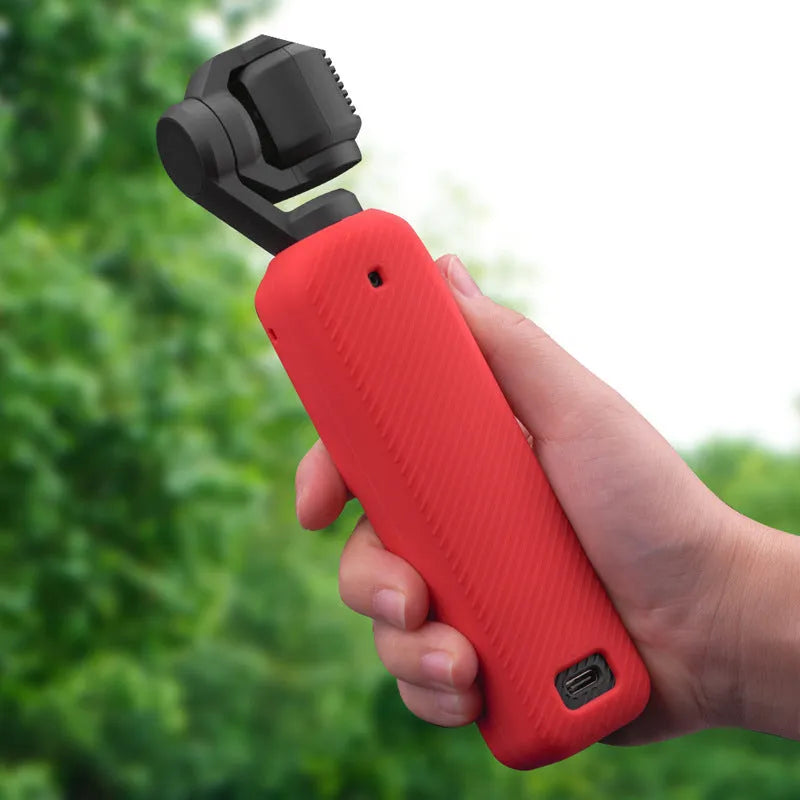 Black, red, and orange silicone protective sleeves for PTZ camera bodies in small and medium sizes