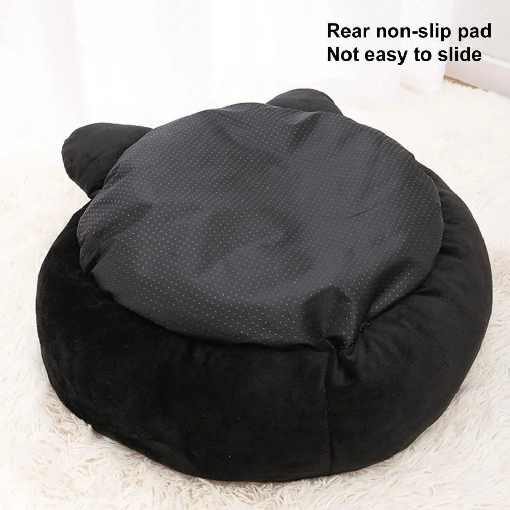 Black cat-shaped velvet pet nest bed with raised edges, shown in small and medium sizes.