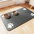 Blue diatomaceous earth pet feeding mat absorbing water spill with dog bowl