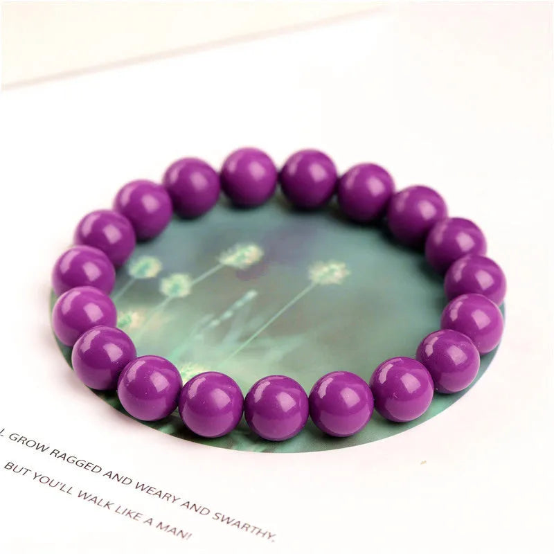Jiuya polished crystal women's bracelet in 5A colour on a wrist, showing single circle bead design.