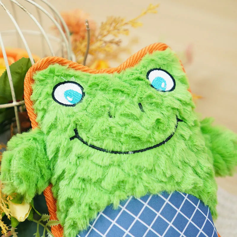 Blue bite-resistant stuffed dog toy with squeaker, safe for molar teeth, next to green and pink versions.