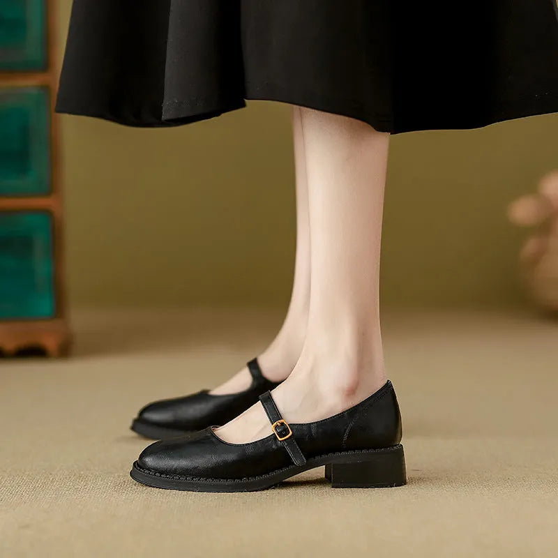 Thick-soled extra height black leather shoes for women with round toe and low top