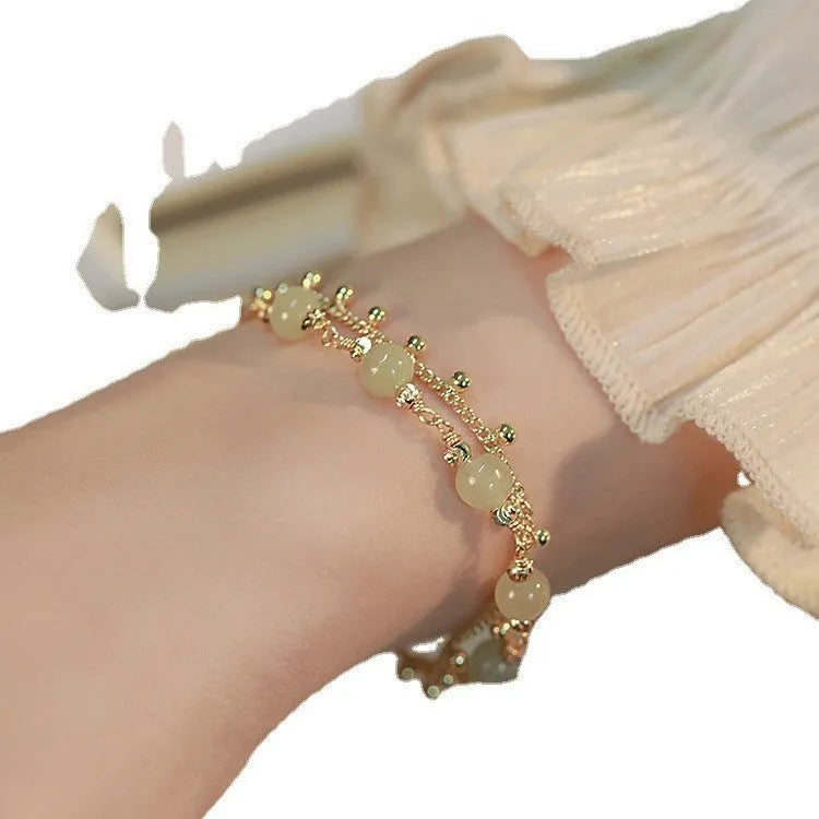 Handcrafted Hetian Jade bracelet with Princess On The Run beaded design for women