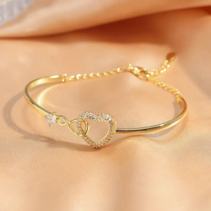 Hollow zircon loving heart opening bracelet for women in gold finish with card flip box