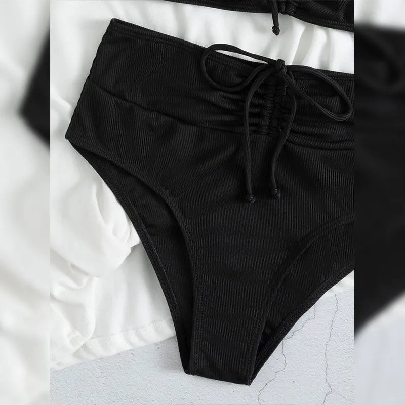 Black women's high waist bikini swimsuit with sling split design and sleeveless cut
