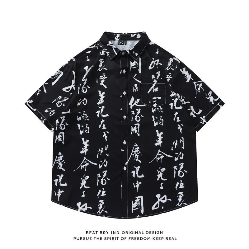 Man wearing a loose-fitting short sleeve printed shirt with a floral pattern, styled like a casual cardigan.