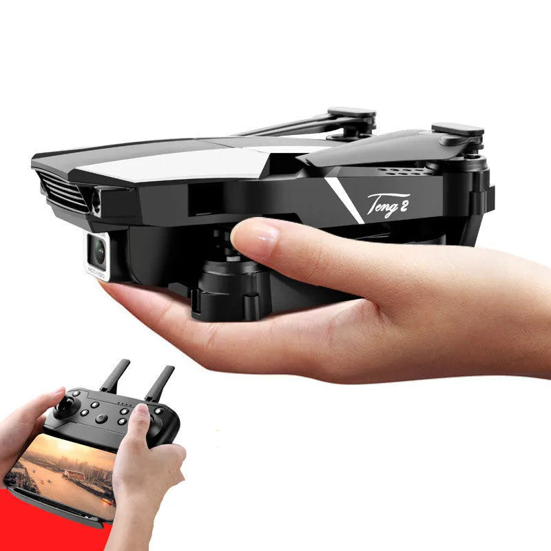 S62 foldable quadcopter drone in black with dual camera and remote control on grass