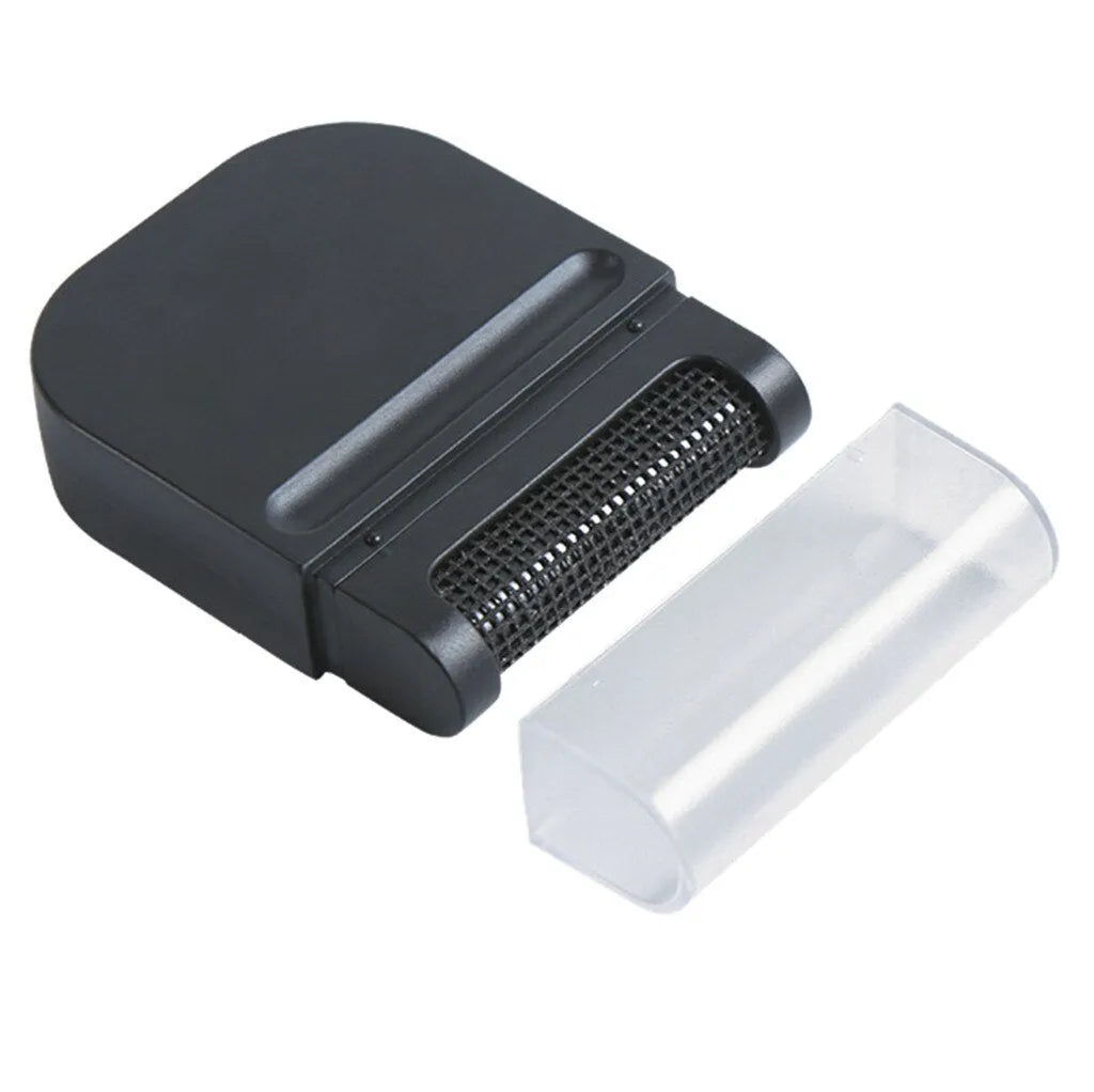 Portable manual clothes cleaning brush with removable catching net on a sweater