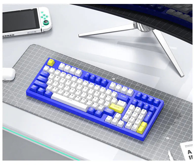 Custom mechanical keyboard and wireless mouse in selected colour option with backlight illumination.