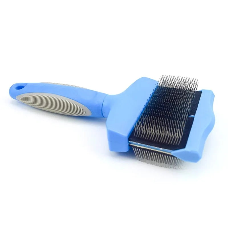 Double-sided stainless steel pet brush for dogs and cats in blue or pink with ergonomic handle