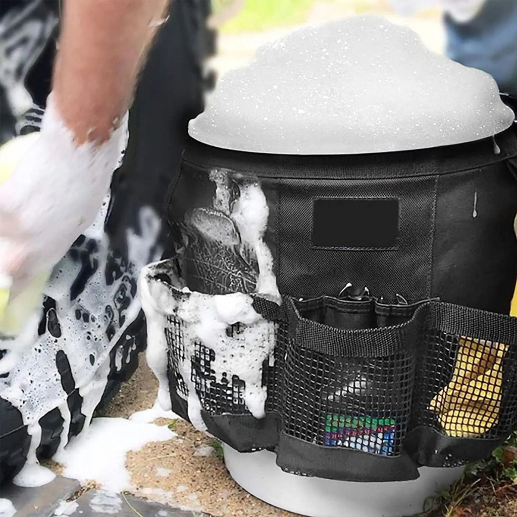 Black cylindrical polyester storage bag hanging on a 5 gallon bucket.
