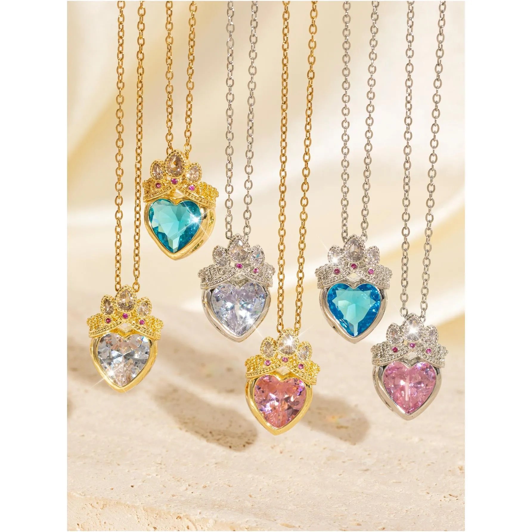Crown and heart shaped zircon pendant necklace in Blue Gold on adjustable copper O-ring chain