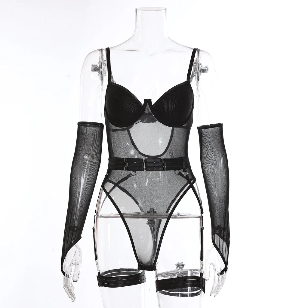 A woman modelling a black mesh see-through jumpsuit tights, a full-body one-piece garment.