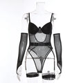 A woman modelling a black mesh see-through jumpsuit tights, a full-body one-piece garment.