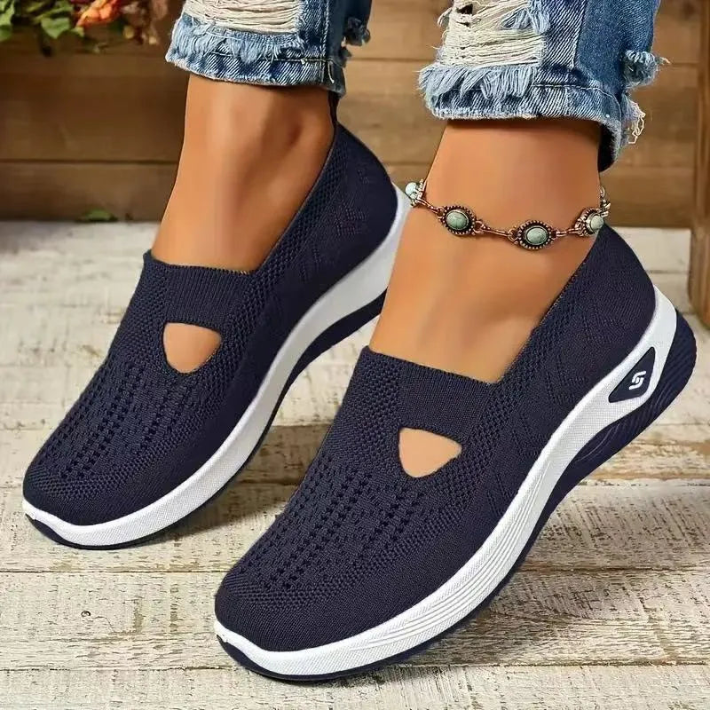 Women's casual mesh shoes with a T-strap and soft PVC sole in multiple colours.