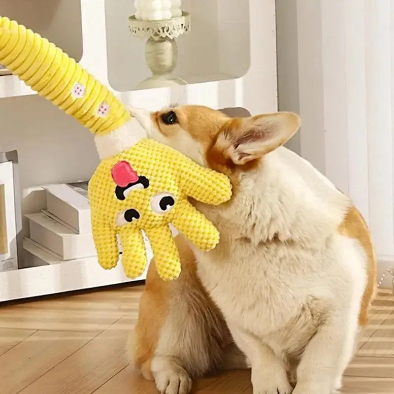 Yellow palm-shaped squeaky plush dog teething toy with bite-resistant fabric, soft texture, and compact size for puppy chewing play