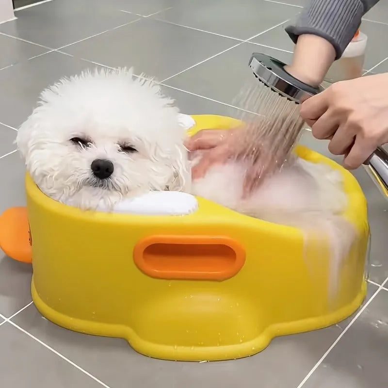 Blue PVC duck-shaped portable bathtub for washing dogs and cats, shown folded and unfolded.