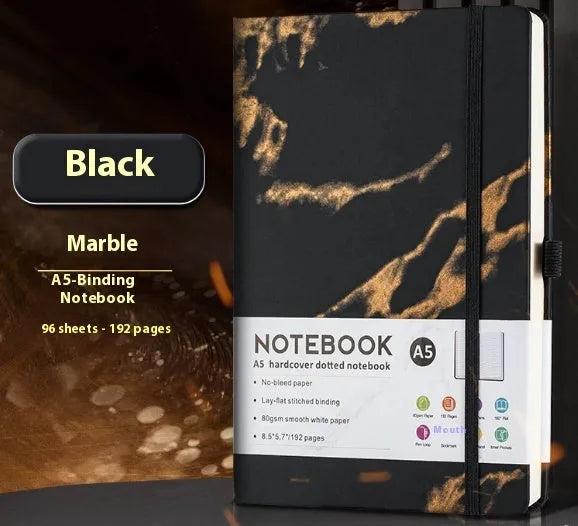 A5 size notebook with soft skin-feel PU leather cover and strap closure, open to show horizontal lined pages.