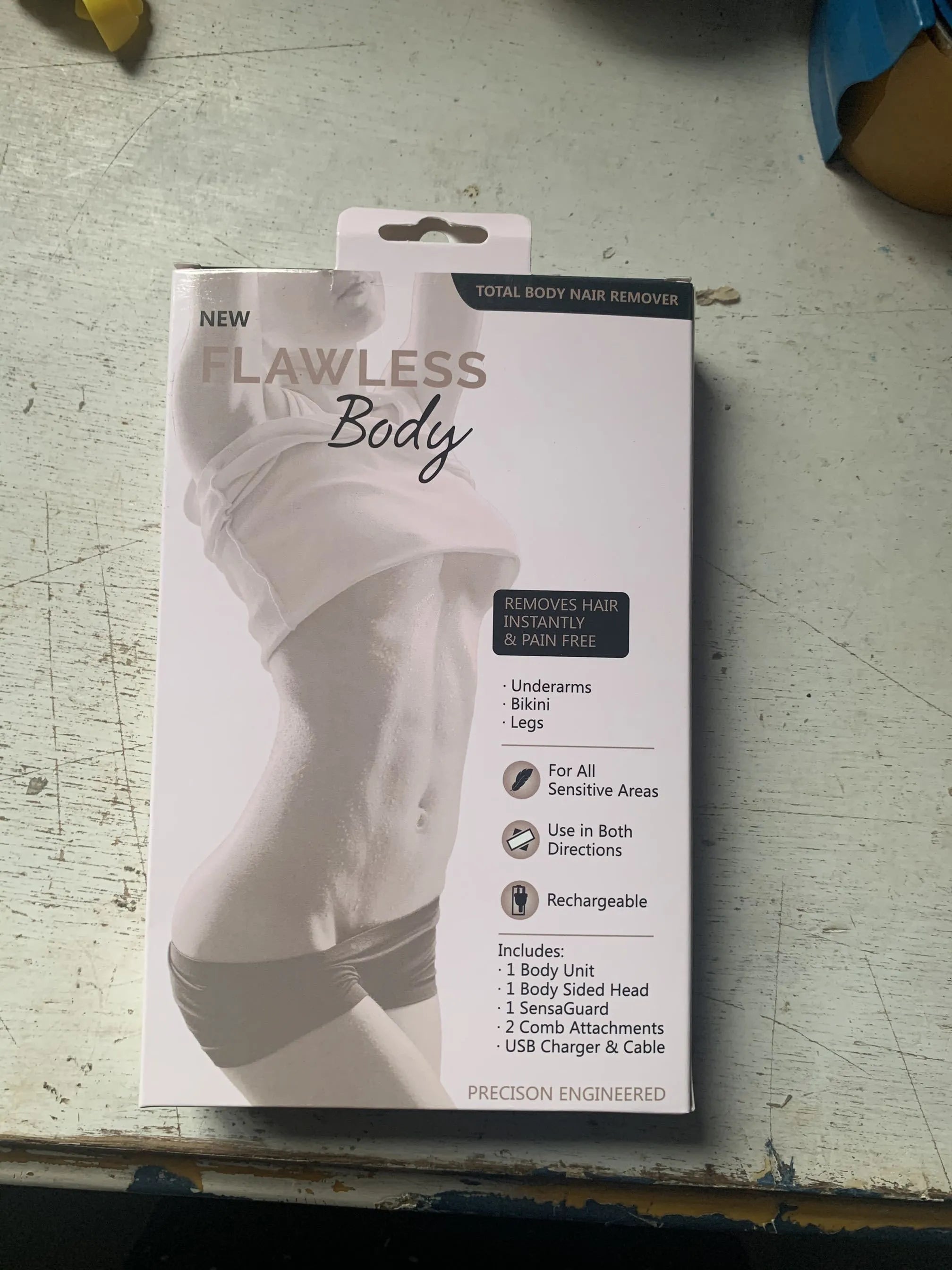 White ABC electric whole body shaver for men and women, cordless and rechargeable, on a plain background