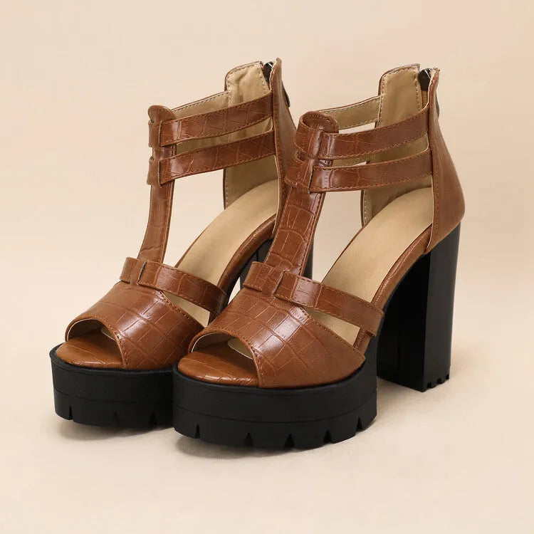 Women's black platform high heel sandals with a round toe and a back zipper fastening.