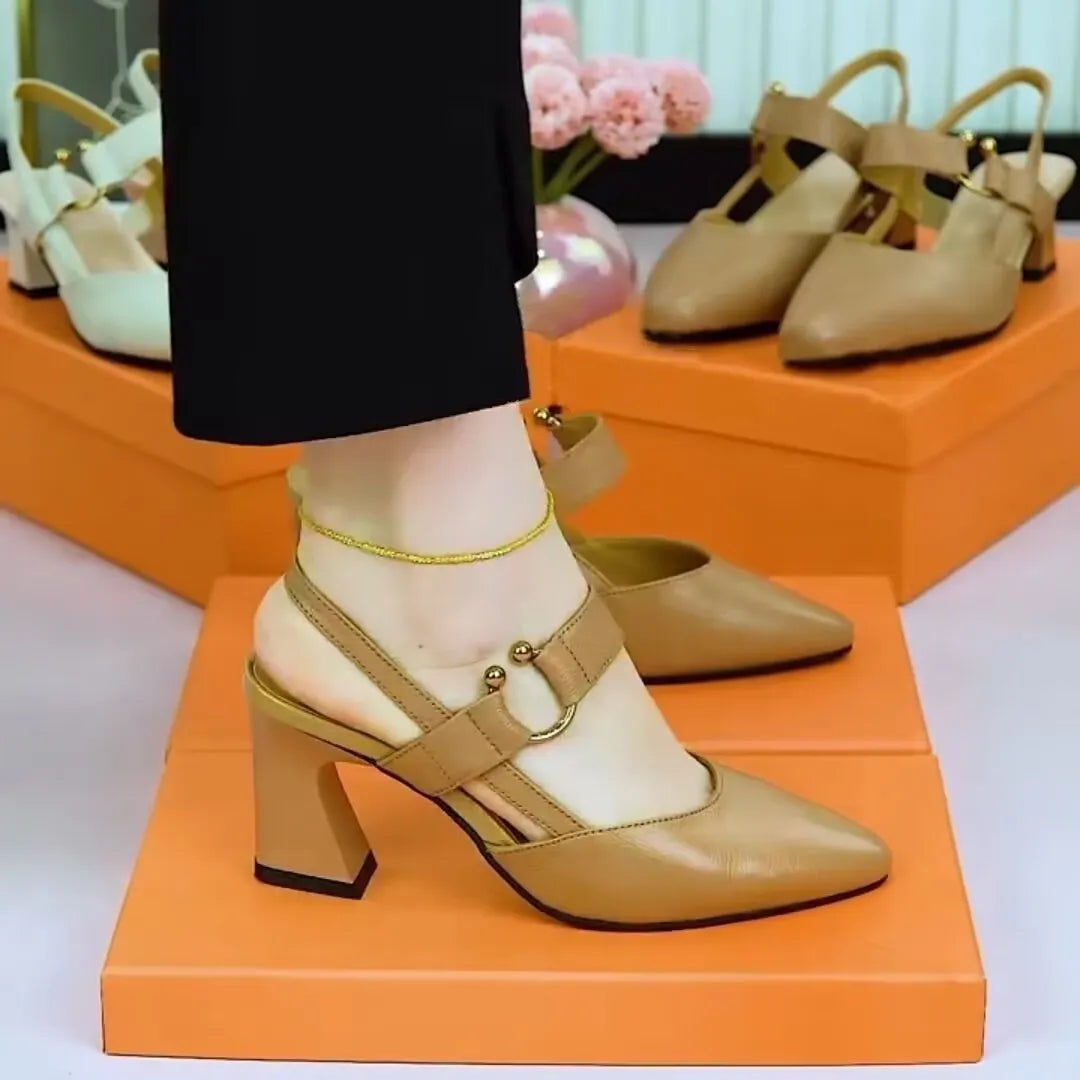Women's apricot pigskin sandals with a closed toe, chunky heel, and backless oversleeve design.