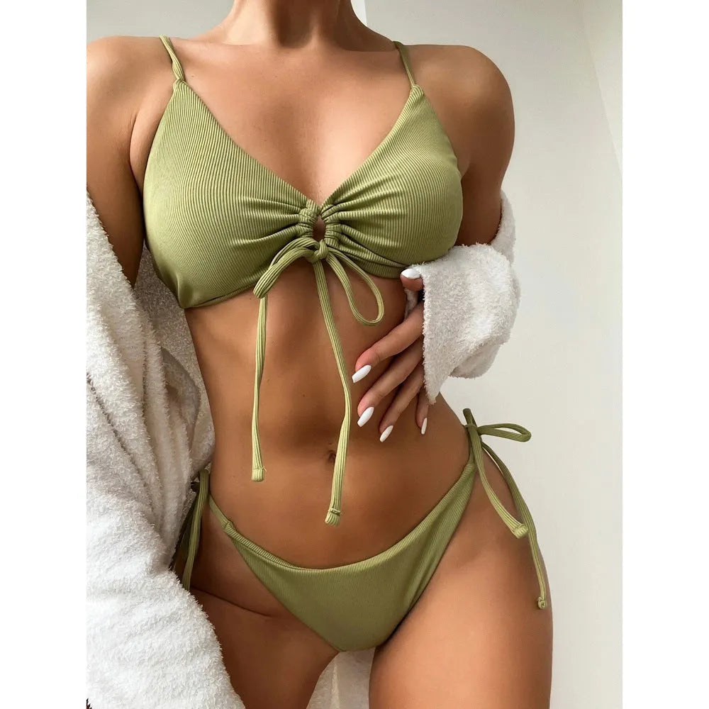 Women's solid colour drawstring bikini set in army green, showing bra and backless briefs.